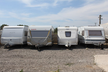Four caravan on depot